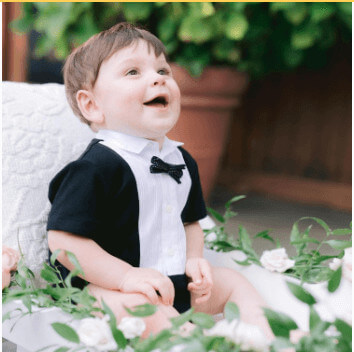 Chase walking down the aisle at his parents wedding